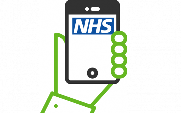 hand holding phone with NHS logo on it